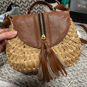 Brown woven tassle cross body purse